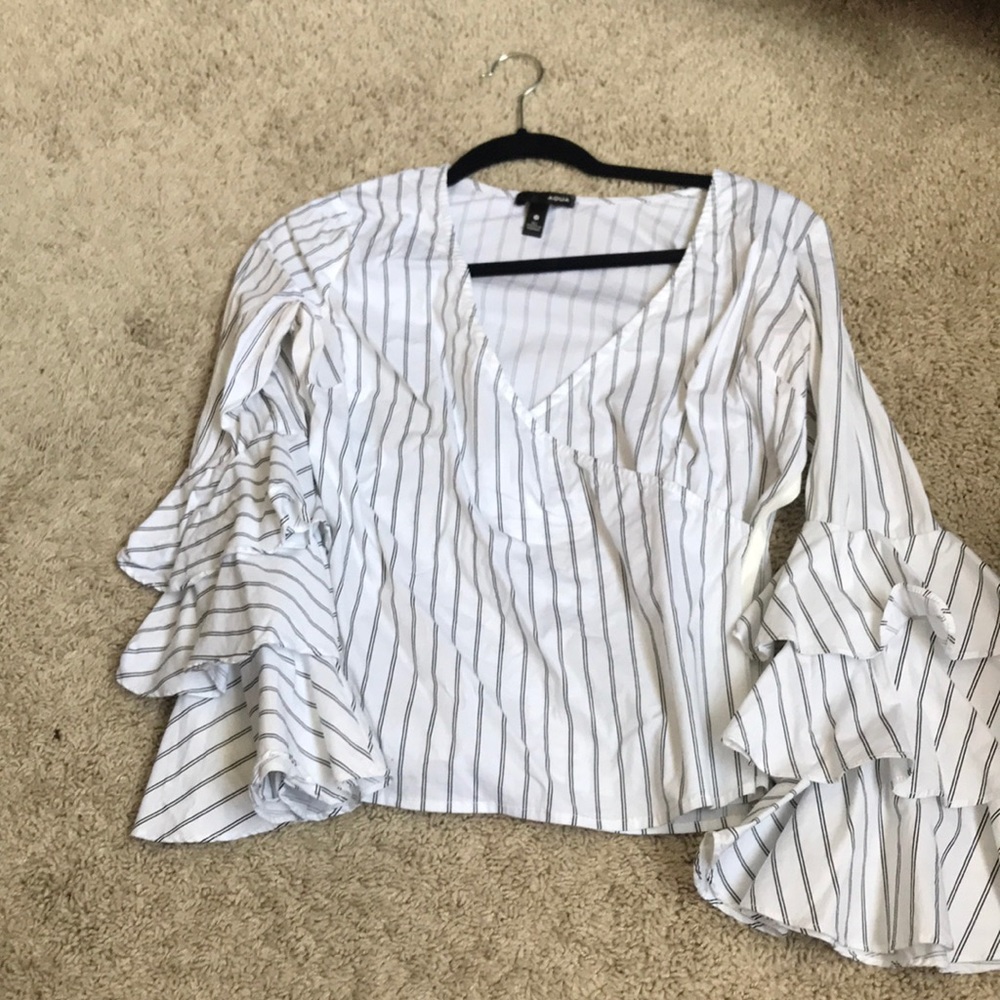 Aqua striped top with ruffle sleeve.
